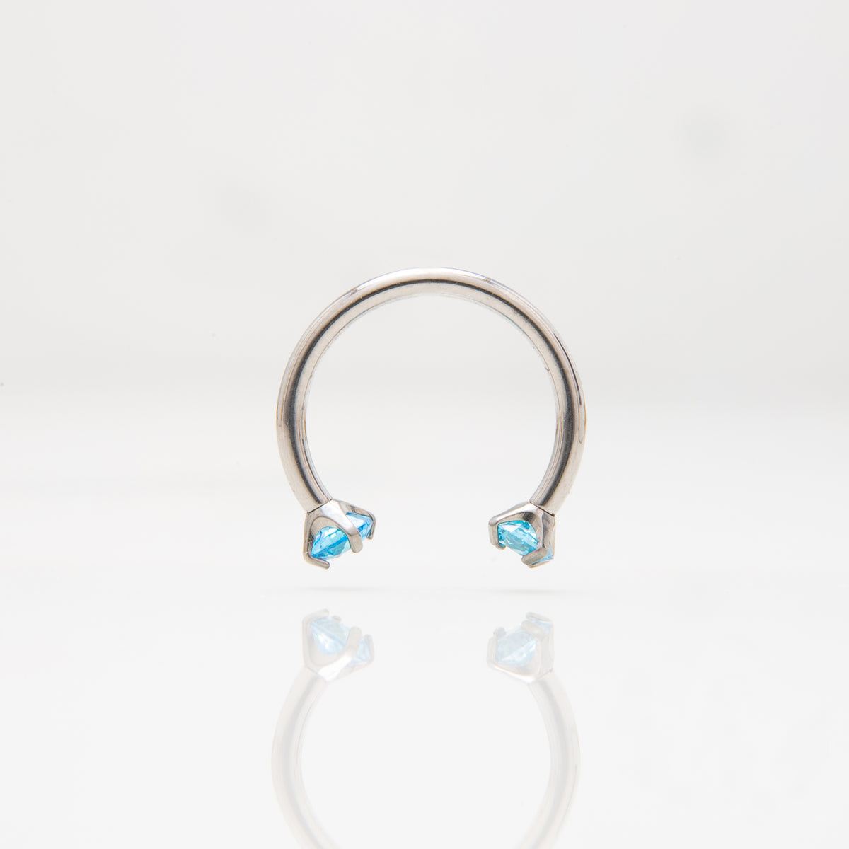 Potkova - S plavim cirkonom promjera 3 mm - 1.2 mm - Titan