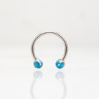 Potkova - S plavim okruglim kamenom promjera 3 mm - 1.2 mm - Titan