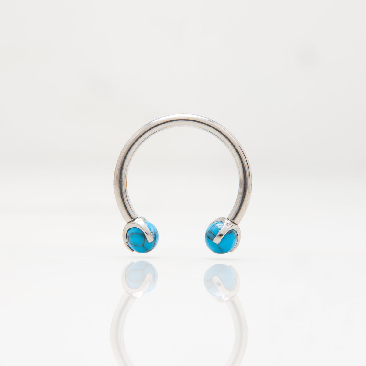 Potkova - S plavim okruglim kamenom promjera 3 mm - 1.2 mm - Titan